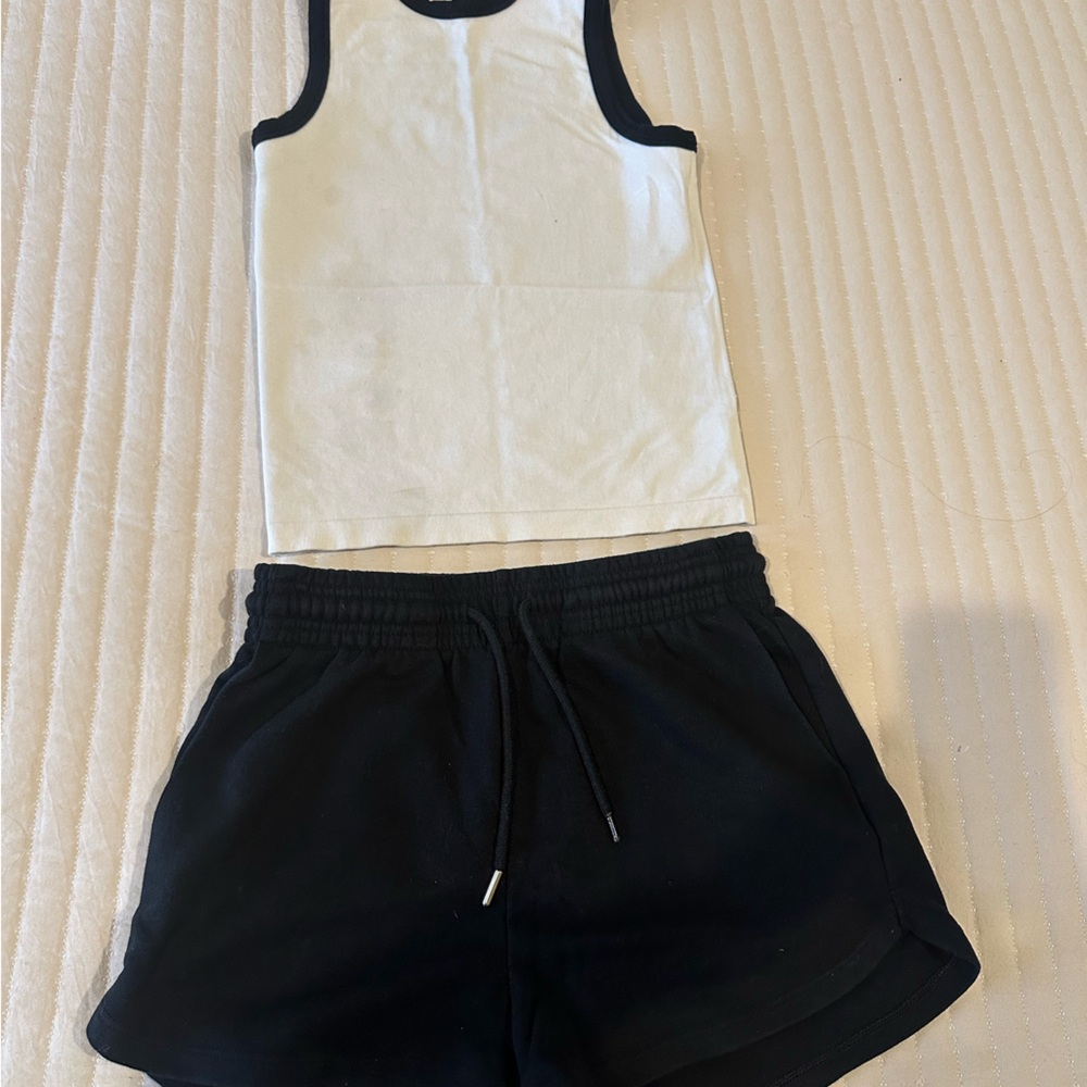 Shorts and tank size small (shorts) and size M for tank set
